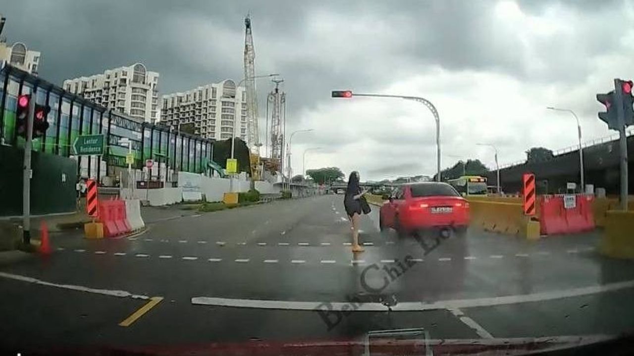 Audi zooms past red light at Lentor Avenue, narrowly misses pedestrian